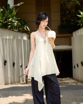 Đầm 2 dây babydoll nữ THE C.I.U, váy cổ V lệch tà chất tơ dáng xòe mềm mại đi biển – Lyric Dress